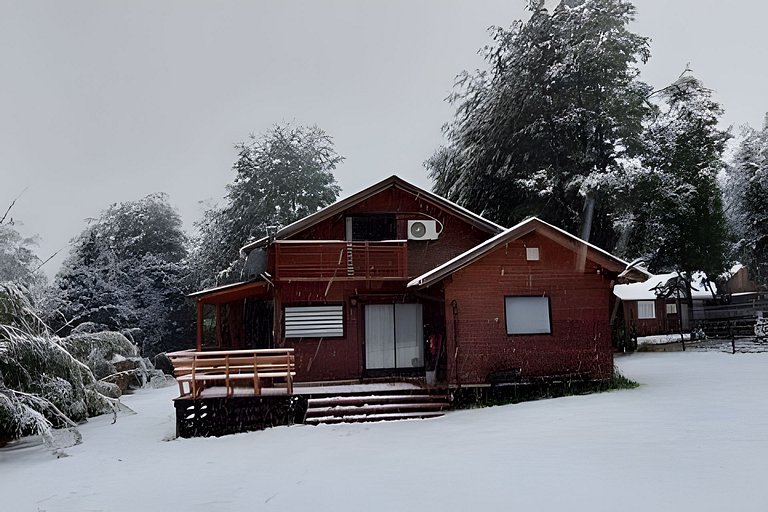 Cabaña Tinaja y vista al volcán